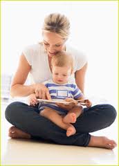 Mother reading to baby 